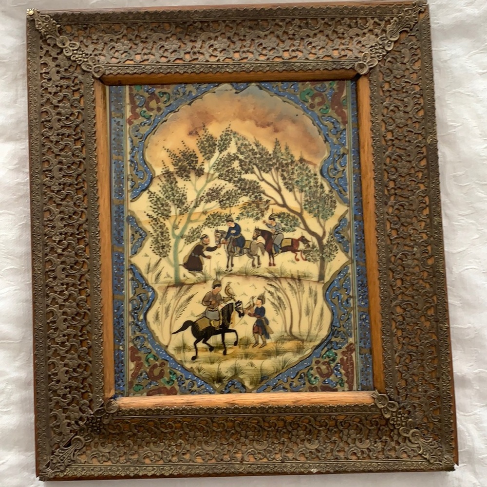 Hand painted on ivory? I am not an expert!! This is a very beautiful .